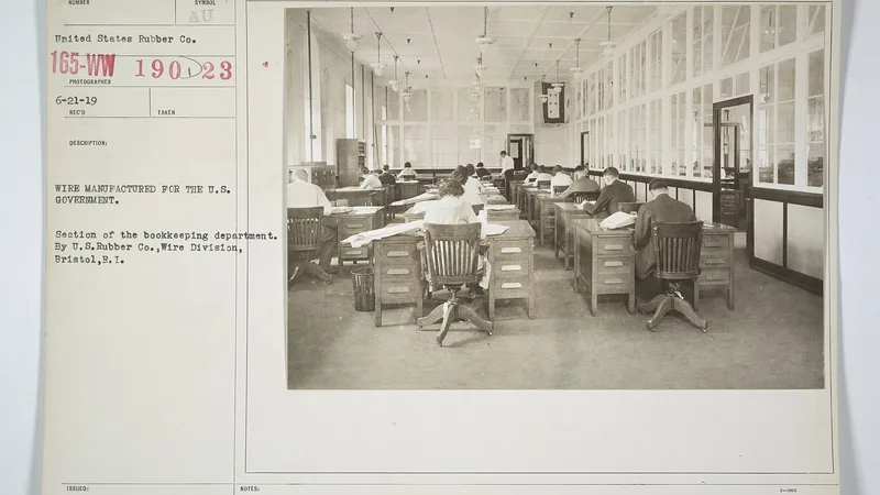 No copyright restriction A 1919 National Archives photograph of a bookkeeping department, with clerks at rows of wooden desks.