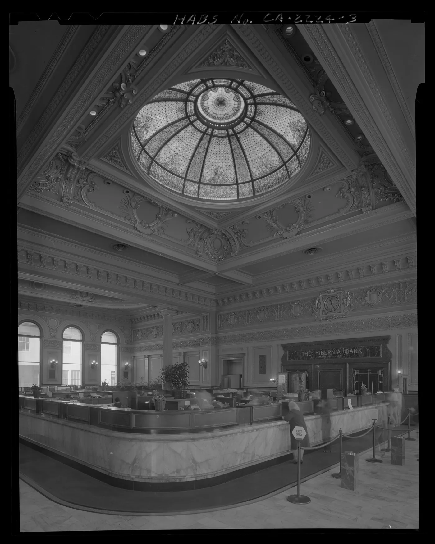 The teller counter and stained-glass dome of the Hibernia Bank in San Francisco.